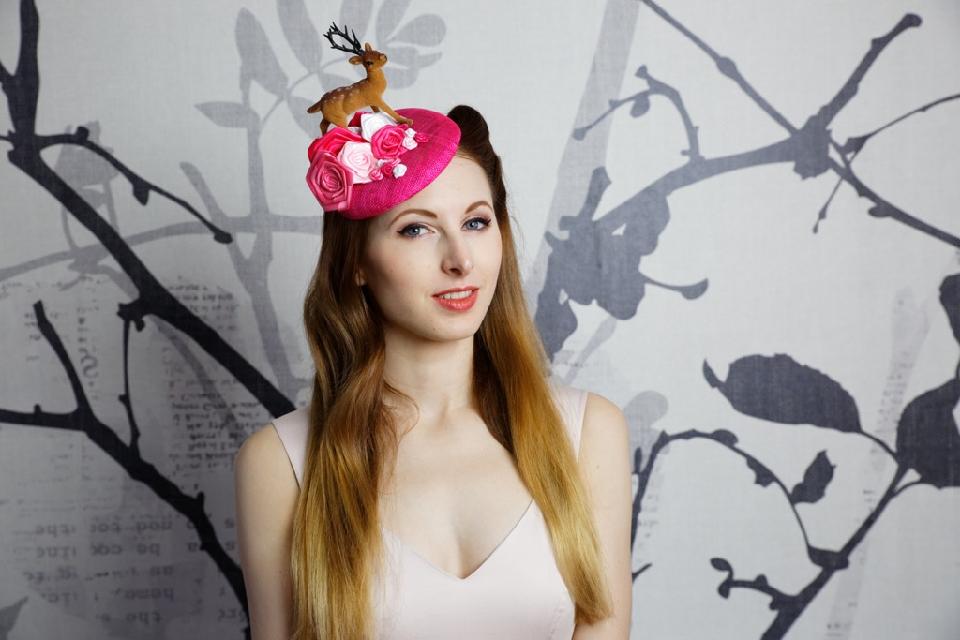 IMAGE - Pink sinamay fascinator with deer and pink and white ribbon roses. Fixes to hair with a comb.
