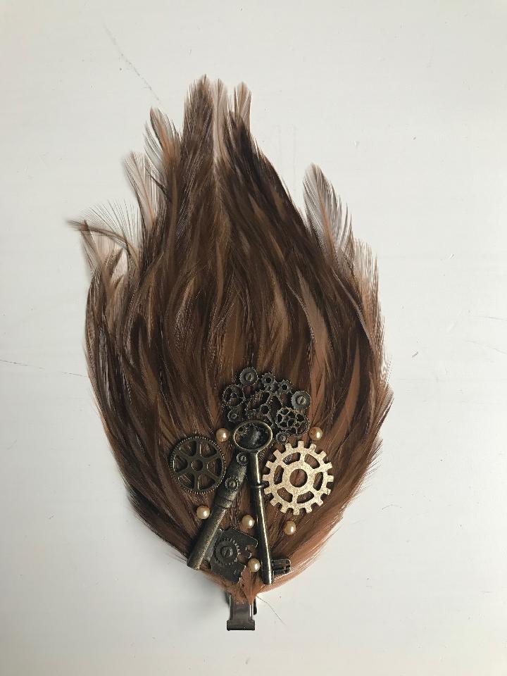 IMAGE - Lightbrown featherpad with bronze gears, keys and cream pearls.
