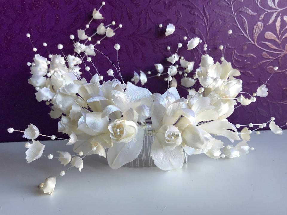 IMAGE - Large vintage bridal hairpiece.
These are the only items on the site not handmade by me. 
They are an old stock and have never been worn. 
Fixes to the hair with a comb.