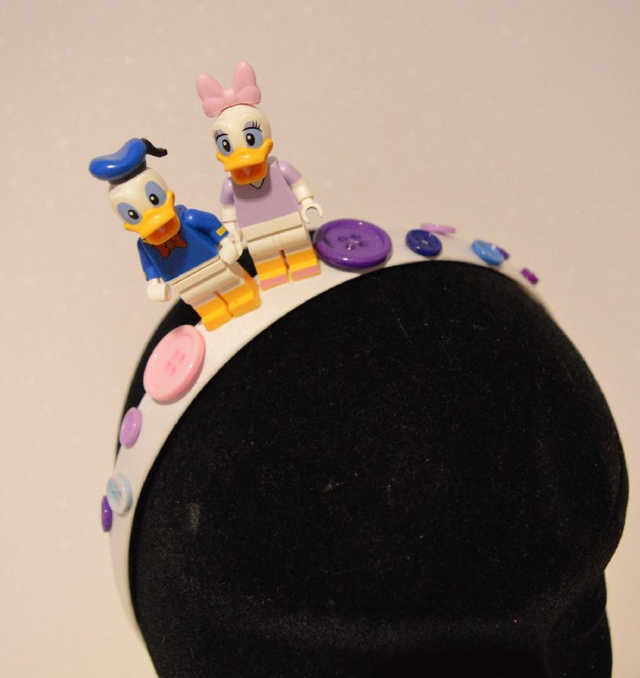 IMAGE - White satin headband with Daisy and Donald duck, decorated with buttons in various colours.