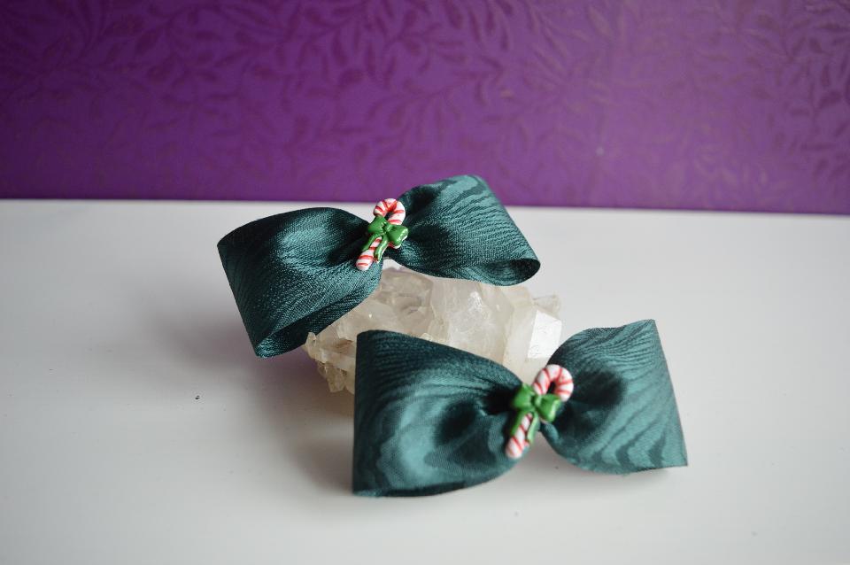 IMAGE - Set of two dark green hairpins with candy canes.